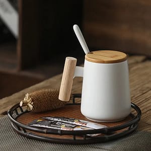 Ceramic Tea Mug with lid and spoon.